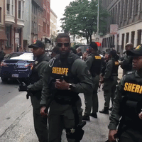 Sheriff Officers Push Back Crowd After Baltimore Police Verdict