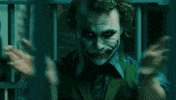 the joker slow clap GIF