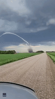 Rope Tornado Stretches Across Rural Saskatchewan Sky