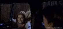 Movie gif. Bella Thorne as Katie hops into the passenger side of a truck and kisses Patrick Schwarzenegger as Charlie in Midnight Sun.