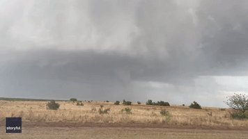 Tornado Forms Over Field Amid Hail Storms Near Paducah, Texas
