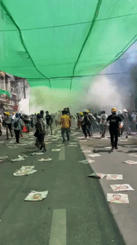 Yangon Protesters Flee Tear Gas Following Day of Deadly Violence