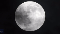 Timelapse Shows Clouds Wafting Over Supermoon in England