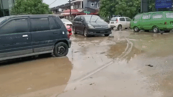 Malaysian Flood Death Toll Continues to Rise