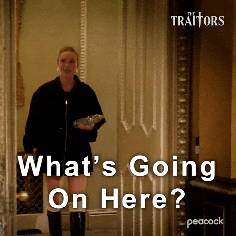 Sponsored gif. Traitors cast member Gabby Windey in The Traitors walks into a room and looks around with a slightly confused expression on her face. Text reads, “What’s going on here?”