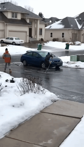 Minnesota Residents Play Ice Hockey on Street Amid Freezing Temperatures