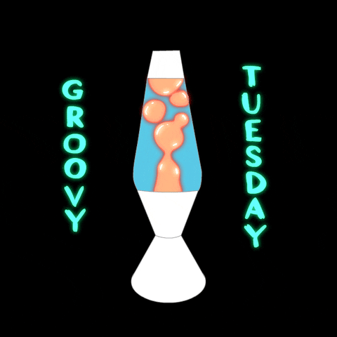 Digital art gif. A lava lamp full of orange lava hypnotically moves around in the lamp. Flashing blue and pink text surrounds it. Text, “Groovy Tuesday.”