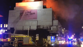 Firefighters Work to Control Fire at London Music Venue