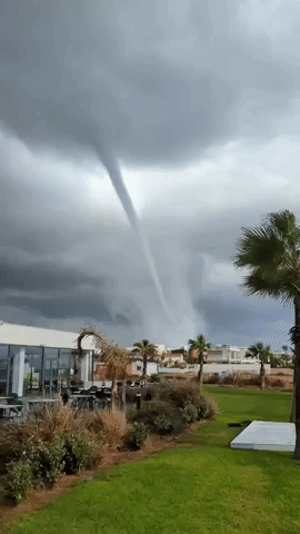 Impressive Waterspout Swirls Ashore at Beach in Cyprus