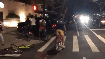 Car Drives Onto Brooklyn Sidewalk, Hitting Protester on Bike