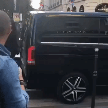 'Prankster' Vitalii Sediuk Fails in Attempt to Kiss Kim Kardashian's Derrière in Paris