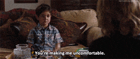 awkward kristen wiig GIF