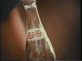 pepsi cola cola commercials GIF