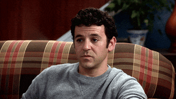 TV gif. Fred Savage as Stewart in The Grinder shakes his head negatively. 