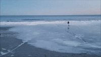 Man's Ice Skating Escapade on Frozen Maine Beach Captured on Video