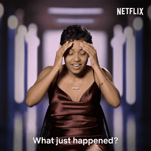Reality TV gif. Iyanna Jones in Love is Blind sits in a chair during a confessional, facing us, and grabs her forehead with both hands. Looking incredulous, she asks, "What just happened?"