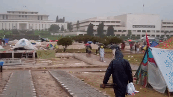 Protests Dampened by Heavy Rain in Islamabad