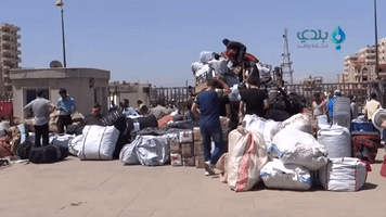 10th Rebel Convoy Leaves al-Waer Neighborhood Under Evacuation Deal
