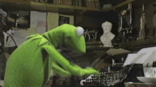 kermit the frog types fast on a typewriter