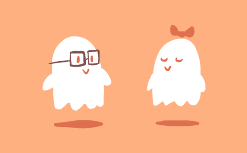 Cartoon gif. Two cute ghosts, one with glasses and one with a bow on their head, float next to each other. The ghost with the bow floats with closed eyes and a smile as if waiting for a surprise. The glasses ghost leans over and smooches their cheek. A small heart appears between them.
