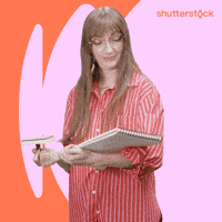 Sponsored gif. Woman dramatically stamps the notebook she’s holding with an oversized rubber stamps. Text that looks like a stamp appears and it reads, “Approved.”