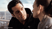 TV gif. Dominic Rains as Crockett puts his arm around Torrey DeVitto as Natalie on Chicago Med, as she leans her head on his shoulder and they rock back and forth.