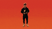 Video gif. Yung Swag dances with his tongue hanging out and intermittent pauses that punctuate his moves. Text, "This."