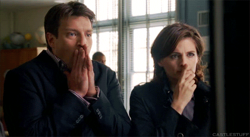 TV gif. Standing next to Stana Katic as Kate, Nathan Fillion as Richard in Castle reacts to something in excitement, pulling his hands from his mouth, as he says, “That was awesome!”