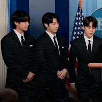 Jungkook smiles.