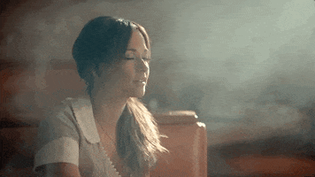 kacey musgraves blowing smoke GIF
