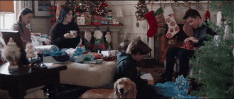 Kate with Lucky the Pizza Dog, Cooper, Lila and Nathaniel Barton, at Barton's house