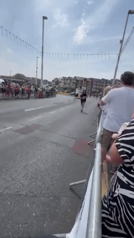 'Proud' 10K Runner Carries Her Baby Over Finish Line