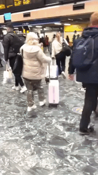 Travelers Rush Through London's Euston Station Ahead of Tier Four Lockdown