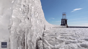 Ice Blankets Chicago Pier as Winter Conditions Affect Lake Michigan