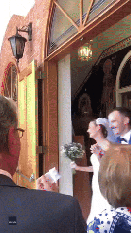 Wedding Guest Mistakenly Throws Sugared Almonds at Bride and Groom