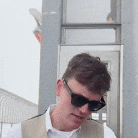Sunglasses Hair Flip GIF by Empire State Building