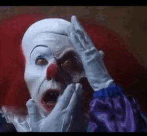 tim curry horror GIF by absurdnoise
