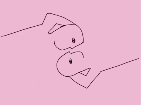 Illustrated gif. Against a soft pink background, two people drawn as outlines that appear identical and mirrored, but reversed, smooch, and a red heart bursts from the center.
