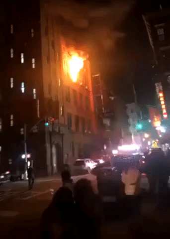 Flames Shoot From Fourth-Storey Windows as New York Apartment Building Burns