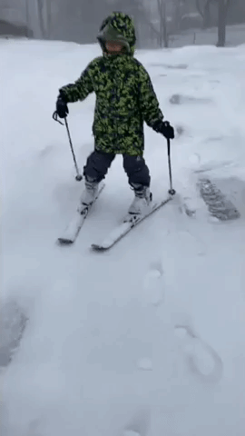 Boy Cruises Down Boston Streets on Skis During Blizzard