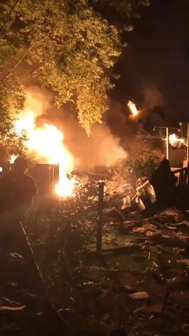 Woman Detained After Car Hits Ontario Home, Causing Explosion and Large Fire