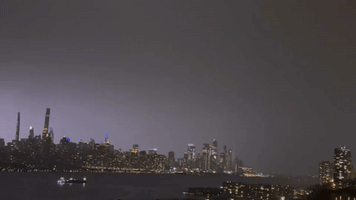 Upward Lightning Forks Over Manhattan Skyline