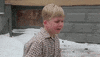 Movie gif. A sad Peter Billingsley as Ralphie from a Christmas Story sits in the snow and sobs.