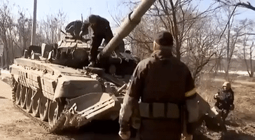 Russian Tank Convoy Near Kyiv Retreats Under Fire, Ukrainian Forces Say