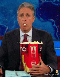 jon stewart popcorn GIF