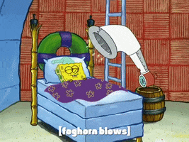 SpongeBob SquarePants gif. SpongeBob is asleep in bed as his foghorn alarm clock blares over him, shaking the room and billowing his blanket. Text, with brackets, "[foghorn blows]."