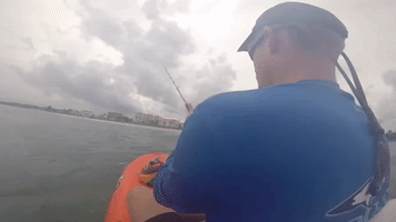 Acrobatic Shark Takes Paddleboarder for a Ride