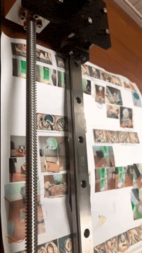 Video gif. Overview of a drafted comic strip laid out on a wooden surface panning from top to bottom.