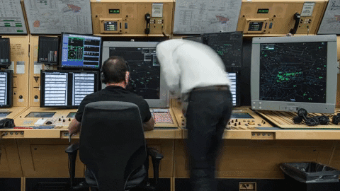 Computer science GIF Man sitting and working at computer while time goes by fast