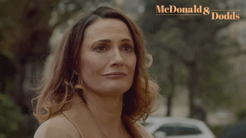 TV gif. Sarah Parish as Mariel Flynn in McDonald & Dodds. She's standing on a street and she looks at us empathetically as she purses her lips and says, "Same."